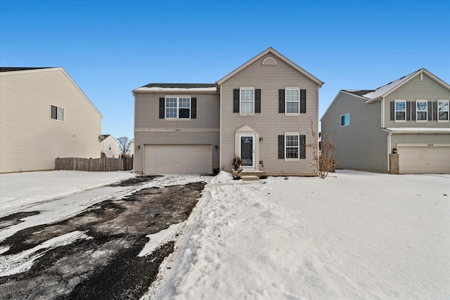 view of front of property with a garage