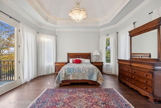 bedroom with access to outside, crown molding, wood finished floors, and a notable chandelier