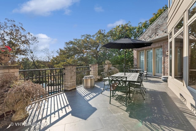 view of patio featuring outdoor dining area