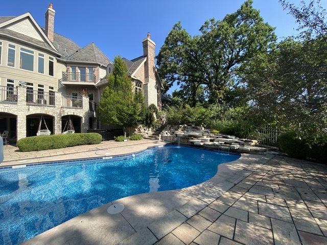pool featuring a patio area