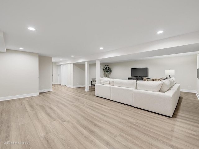 unfurnished living room featuring light wood-type flooring