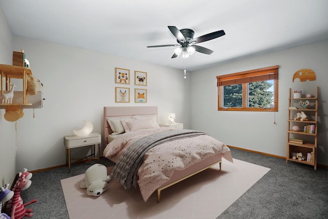 bedroom featuring ceiling fan and dark colored carpet