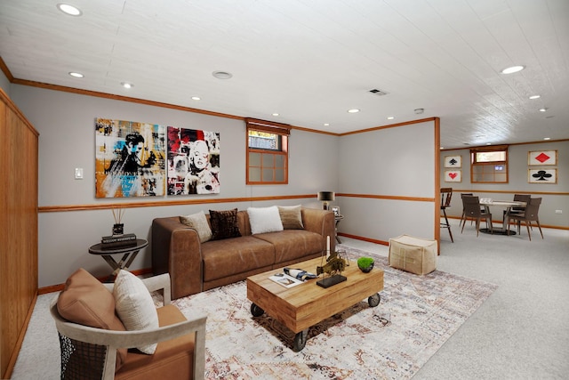 carpeted living room with ornamental molding