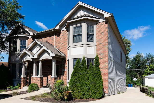 view of front of property with brick siding