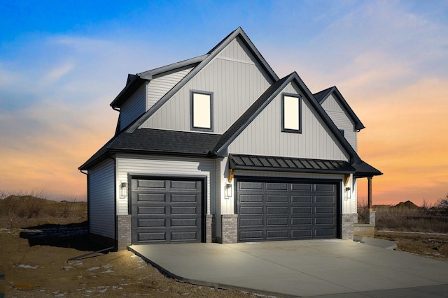 modern farmhouse style home with a garage