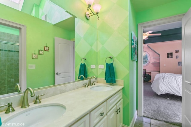 bathroom featuring tile patterned floors and vanity