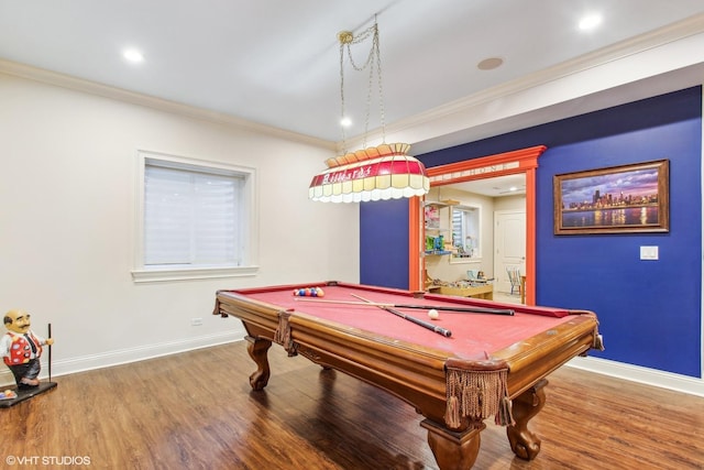 game room featuring ornamental molding, hardwood / wood-style flooring, and billiards