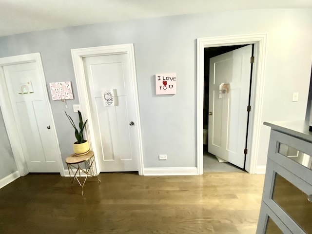 hall with light hardwood / wood-style flooring