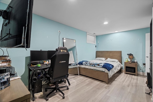 bedroom featuring light hardwood / wood-style floors