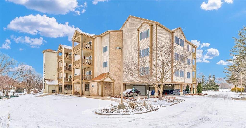 view of snow covered property