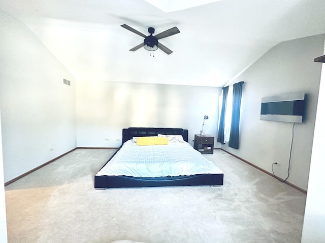 carpeted bedroom featuring ceiling fan and lofted ceiling