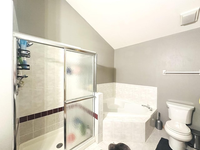 bathroom featuring independent shower and bath, vaulted ceiling, tile patterned floors, and toilet