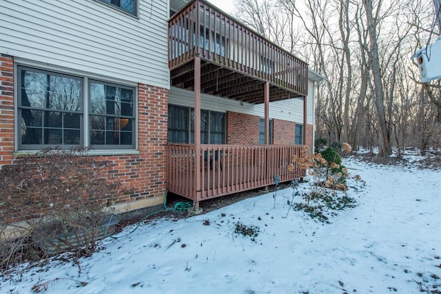 view of snow covered property