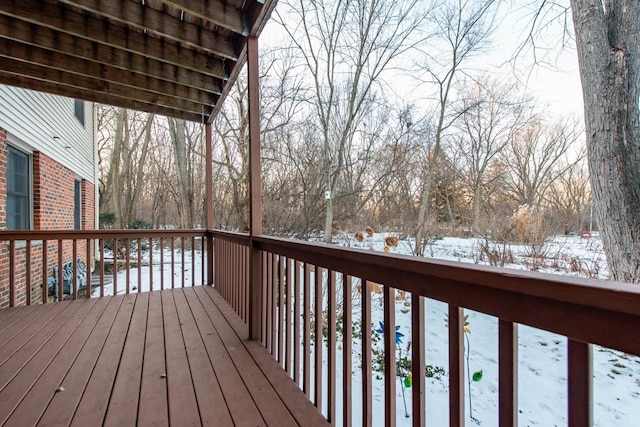 view of snow covered deck