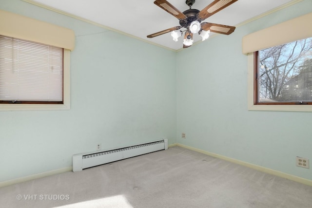 carpeted empty room featuring ceiling fan, a baseboard radiator, and ornamental molding