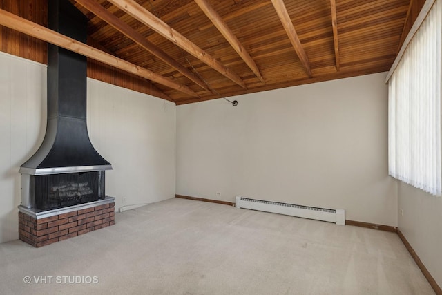 unfurnished living room with a baseboard heating unit, carpet floors, lofted ceiling with beams, wooden ceiling, and a wood stove