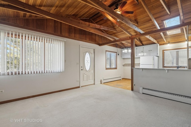 entrance foyer featuring light colored carpet, a baseboard radiator, wooden ceiling, and lofted ceiling with beams