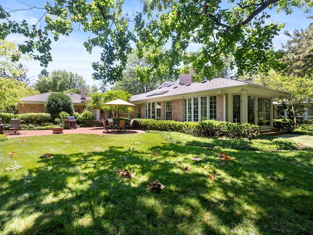 view of yard featuring a patio