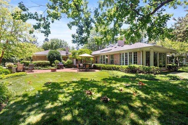 view of yard with a patio area