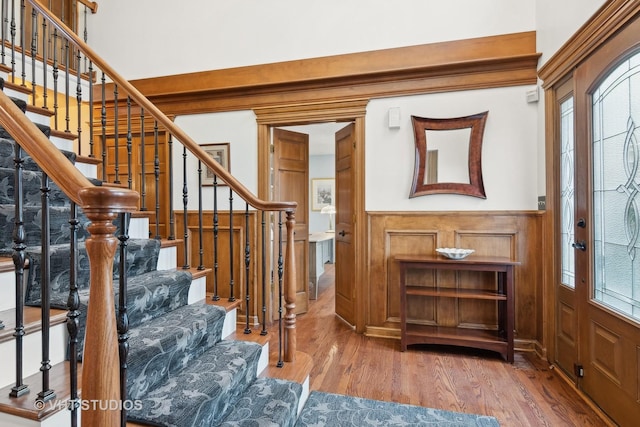 foyer with wood-type flooring