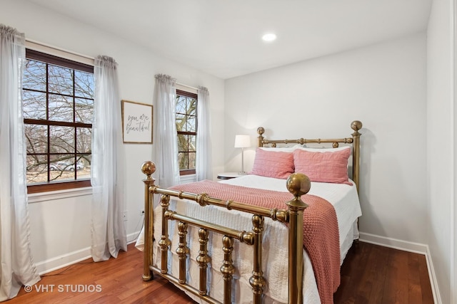 bedroom with wood-type flooring