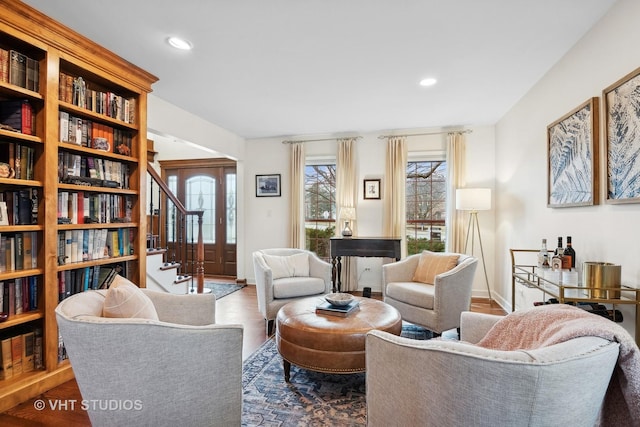 living area featuring hardwood / wood-style floors