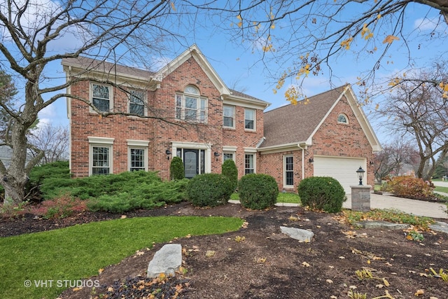 colonial-style house with a garage