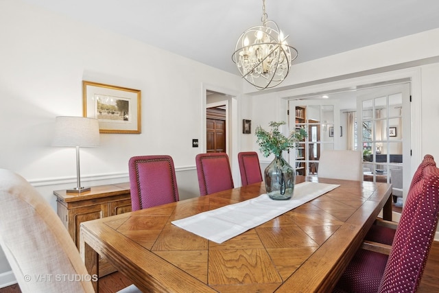 dining room with a chandelier