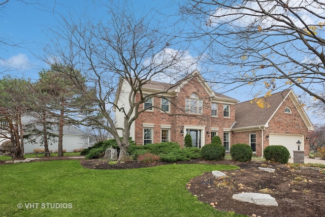 view of front of home featuring a garage and a front lawn