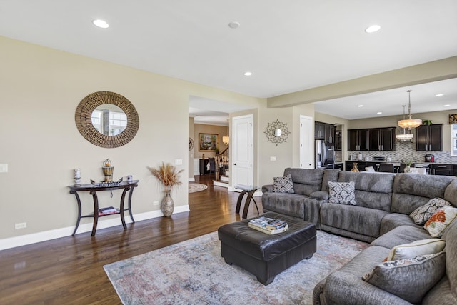 living room featuring dark hardwood / wood-style floors