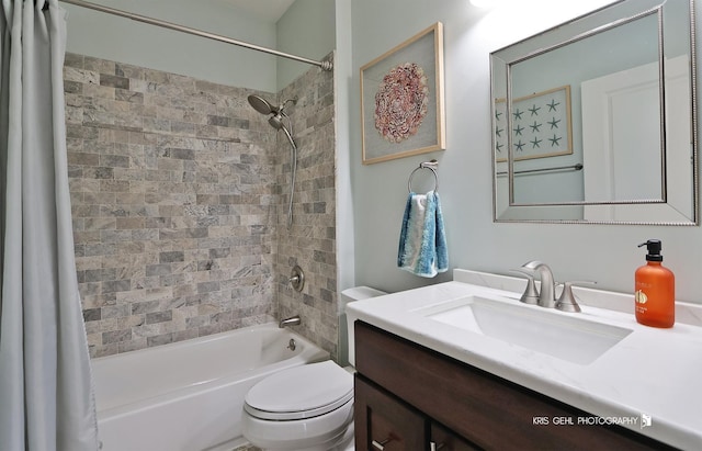 full bathroom featuring shower / tub combo with curtain, vanity, and toilet