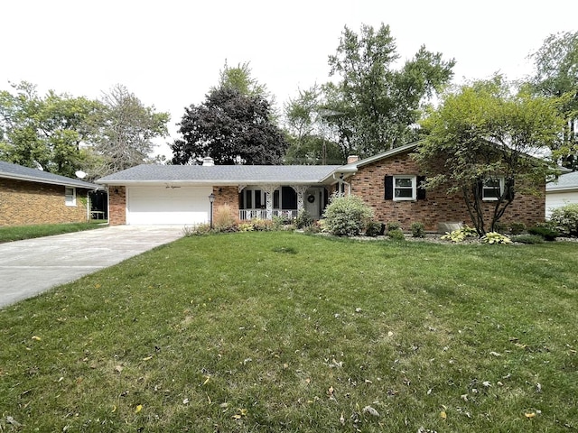 ranch-style home featuring concrete driveway, brick siding, a front lawn, and an attached garage