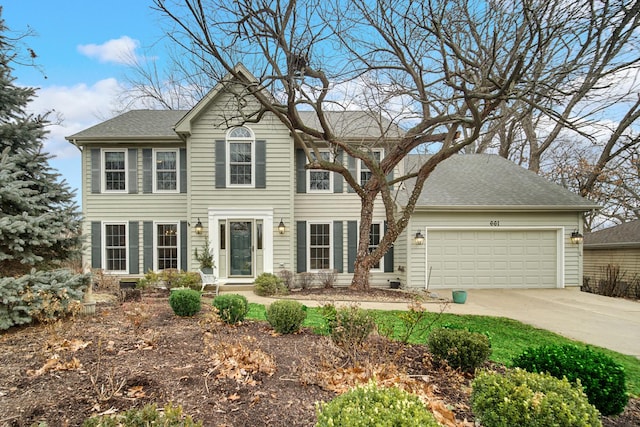 colonial home featuring a garage