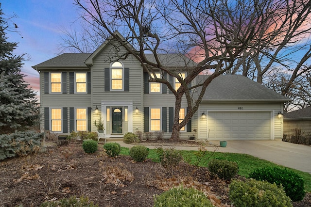 colonial-style house with a garage