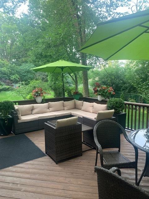 wooden deck featuring an outdoor living space