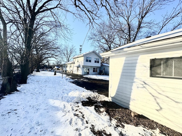 view of snow covered property