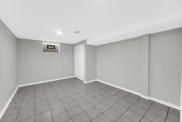 basement with tile patterned floors