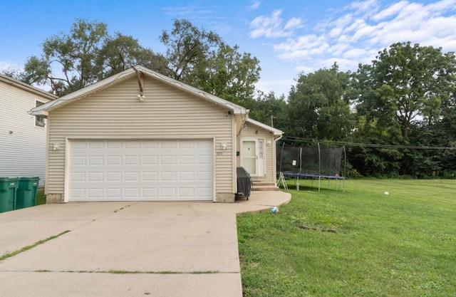 view of front of property with a front yard and a trampoline