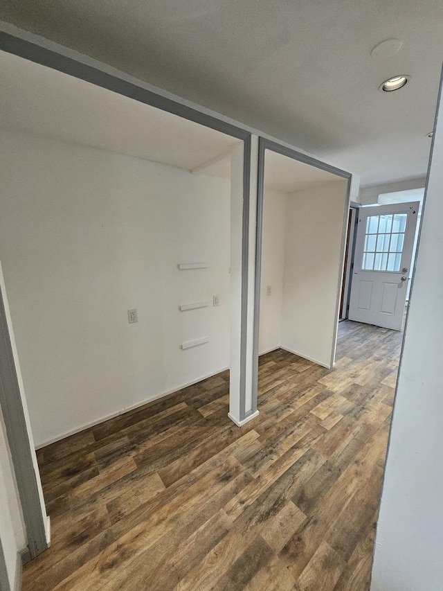 interior space with dark hardwood / wood-style flooring