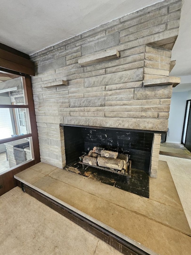 details featuring carpet and a fireplace