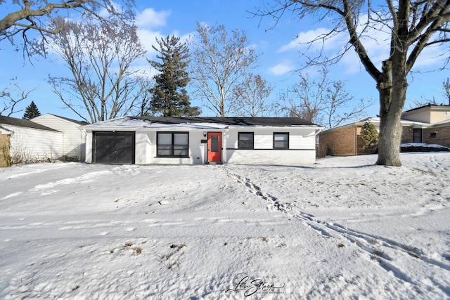 single story home with a garage