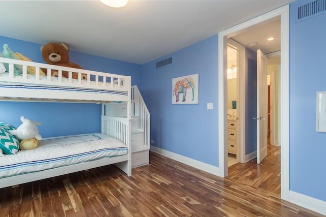 unfurnished bedroom featuring dark wood-type flooring