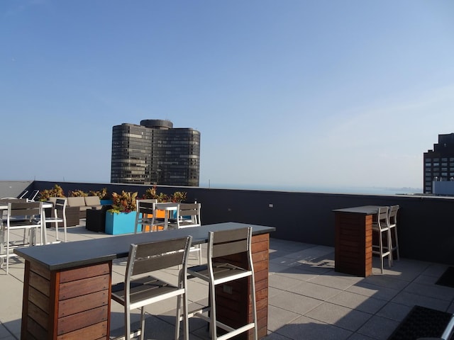 view of patio / terrace featuring an outdoor bar