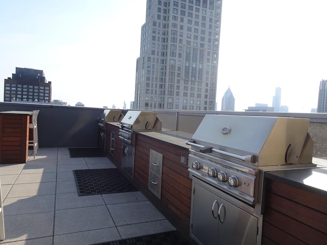 view of patio / terrace with exterior kitchen and grilling area