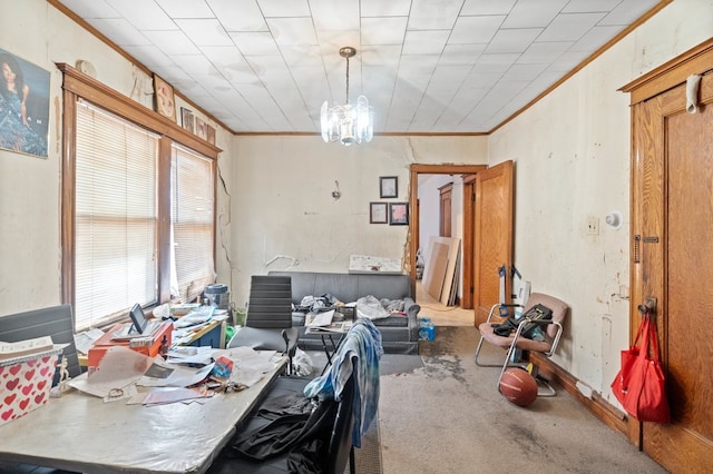 dining space featuring ornamental molding, a notable chandelier, and carpet flooring