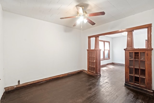 unfurnished room featuring dark hardwood / wood-style flooring and ceiling fan