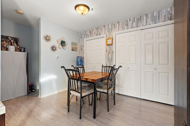 dining area with light hardwood / wood-style flooring