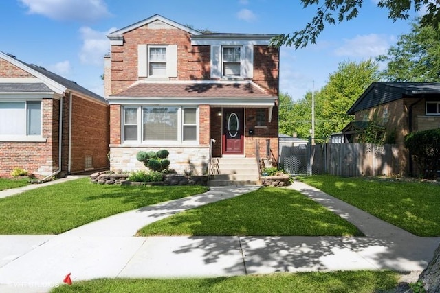 view of front of property featuring a front yard