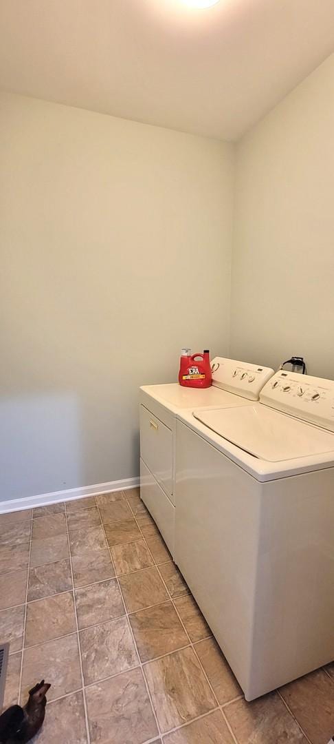 laundry room featuring independent washer and dryer