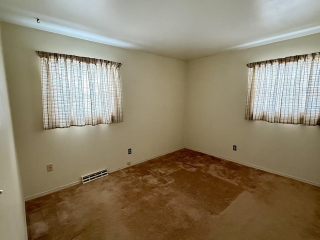 view of carpeted spare room